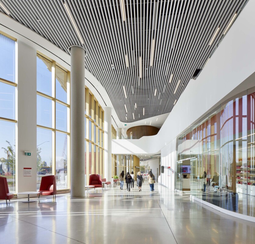 Agilis perforated baffles installed across a wide corridor at York University Markham Campus.